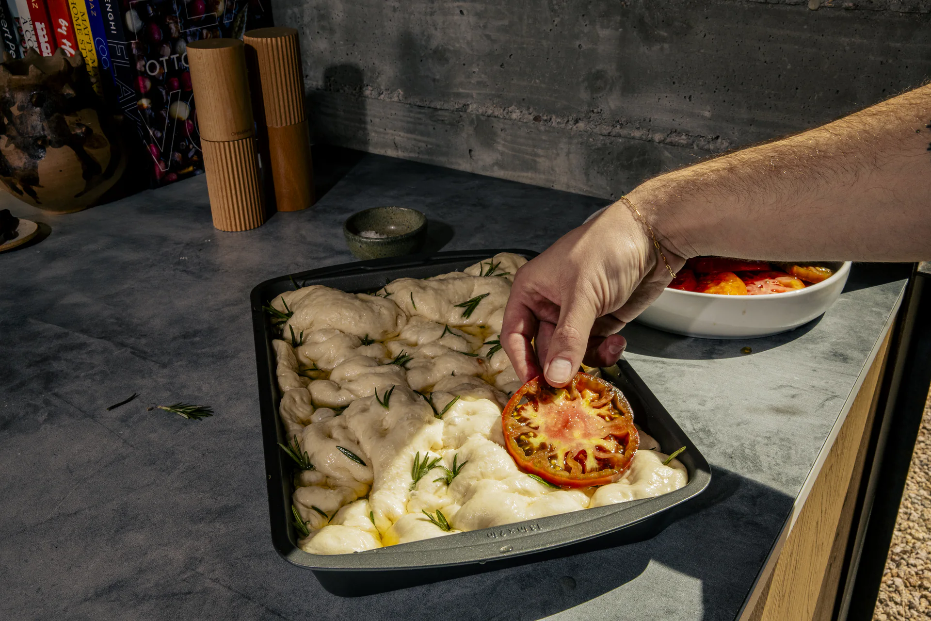 Preparing focaccia.