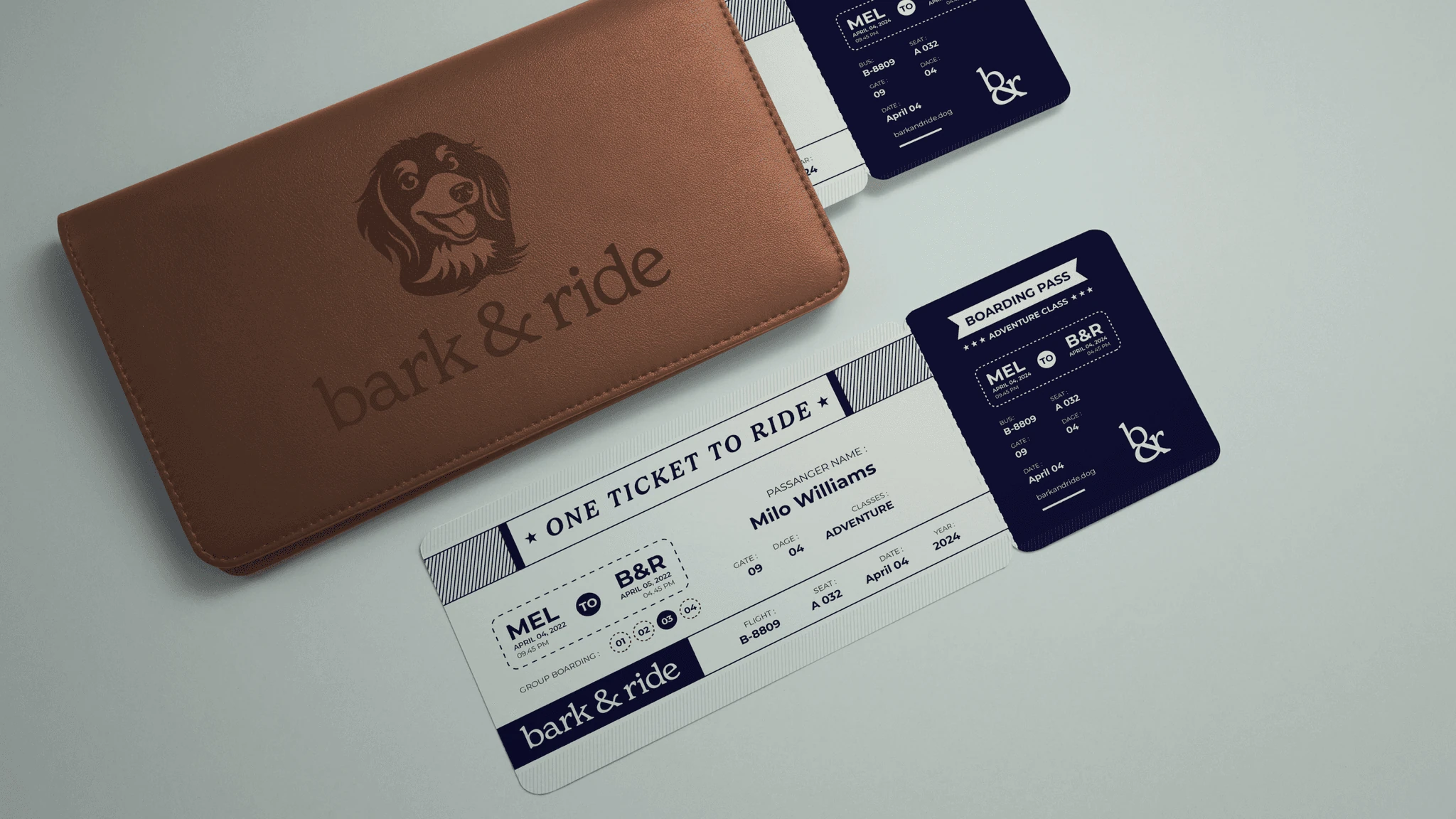 A leather wallet debossed with the Bark & Ride crest, beside boarding-pass style tickets naming the passenger, gate and seat