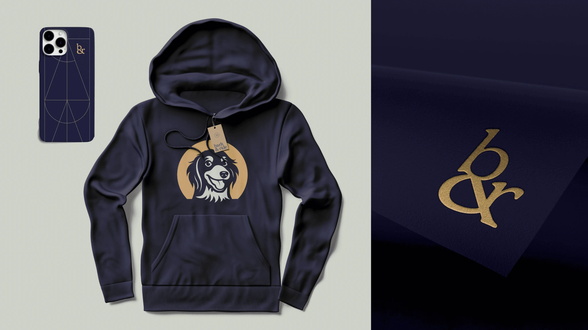 Navy hoodie with the dog crest, a matching phone case, and the gold b&r monogram foiled on navy paper