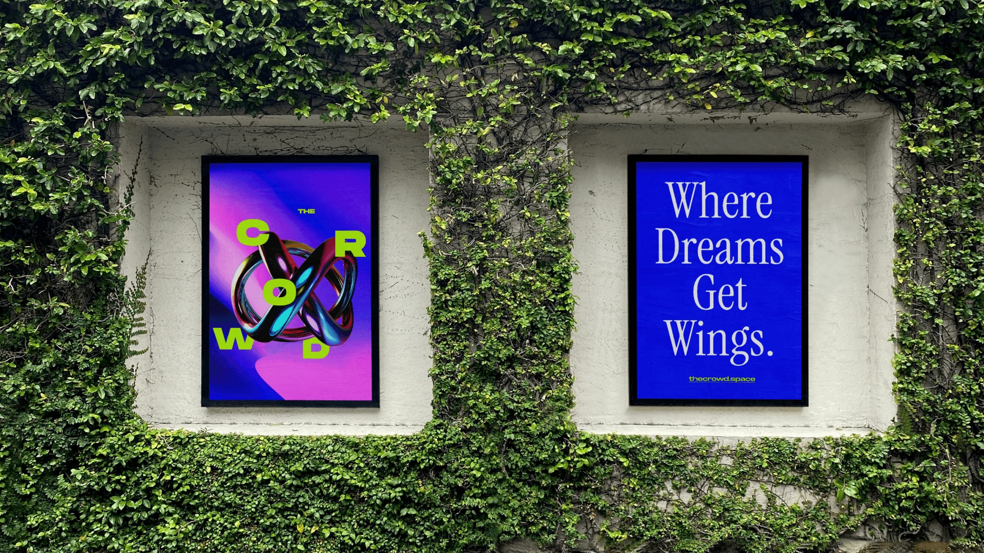 Two framed posters set into an ivy-covered wall: one with the knotted symbol and the word CROWD, one reading “Where Dreams Get Wings.”