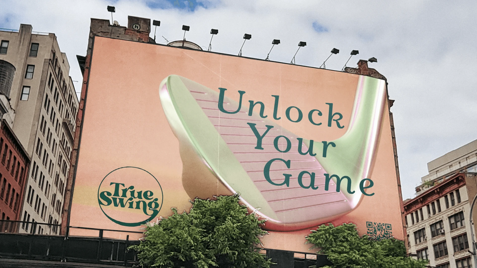 A blush wallscape billboard with an oversized iron face and the line Unlock Your Game