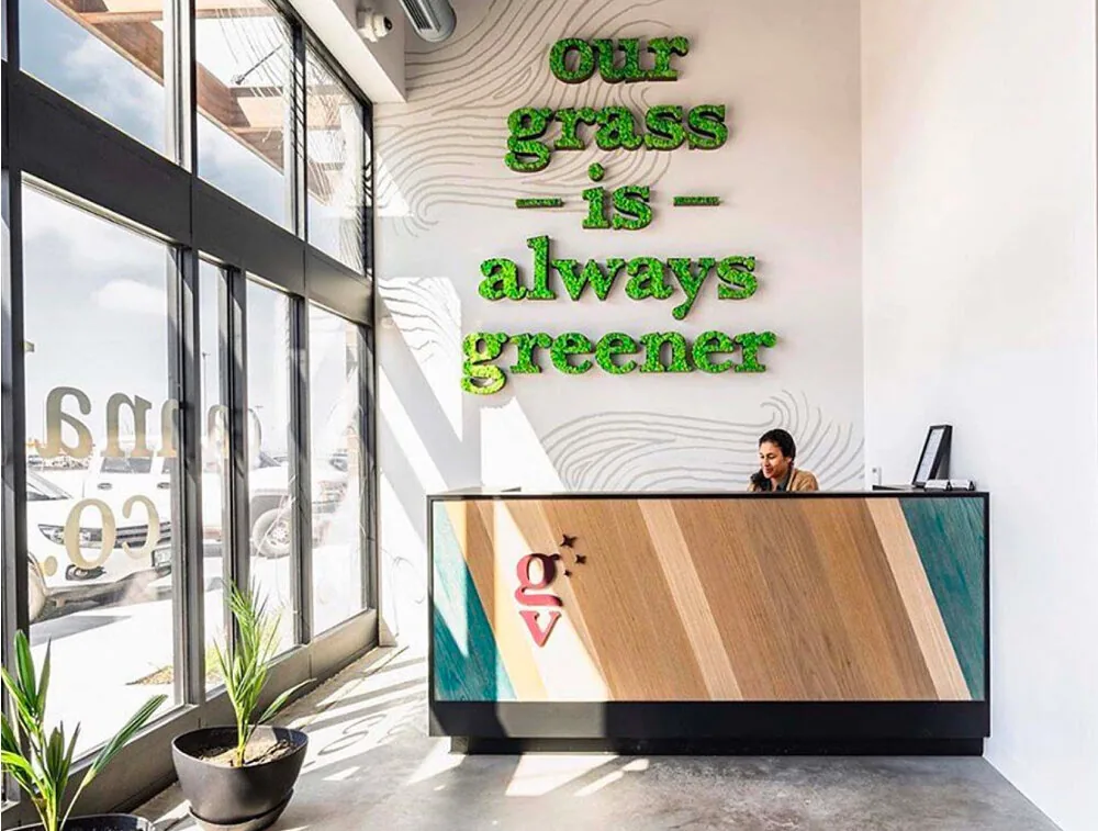 The reception desk carried the brand’s voice into the space.