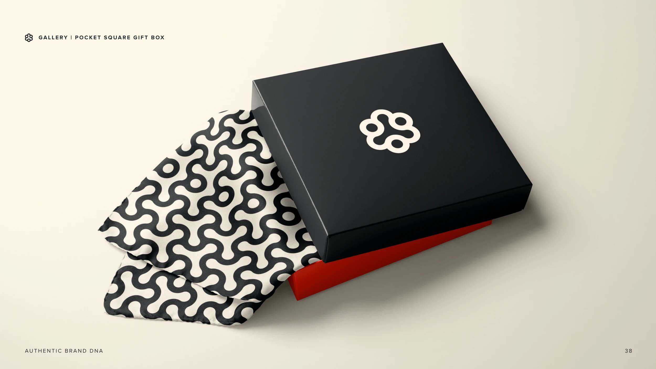 The pattern-wrapped gift box, open, the mark on the black lid