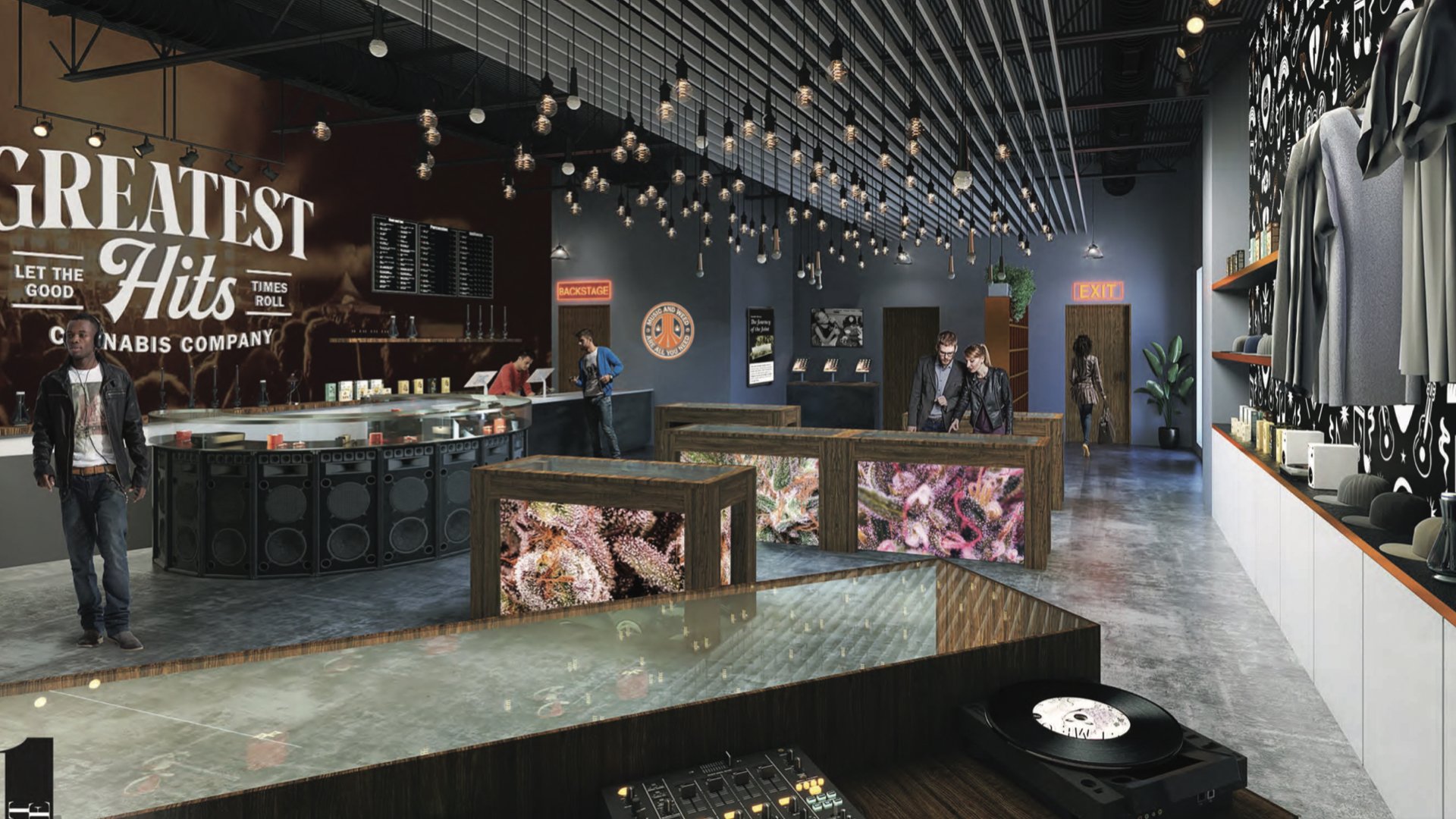 The store interior: the counter in the middle of the room under pendant lights, concert posters along the wall